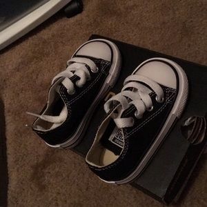 Brand new converse color: black/white size: 4